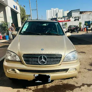 Photo - Mercedes-Benz E320 2003 Gold
