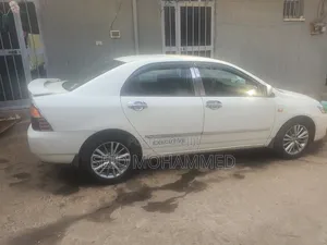 Photo - Toyota Corolla 140i GLE 2007 Ivory