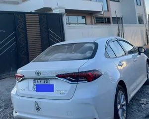 Photo - Toyota Corolla 2024 Ivory