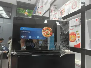 Photo -  Midea 30l Micro Wave Oven – Fast Cooking + Free Delivery! 