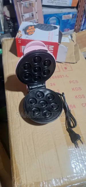 ትንሽየ ዶናት መስሪያ ፈጣን የሆነ