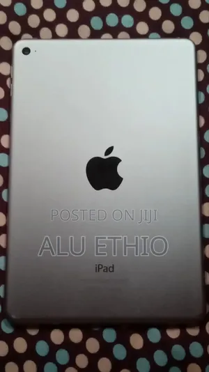 Photo - Apple iPad mini 4 128 GB Silver