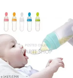 Photo - Silcone Bottle Spoon Feeder