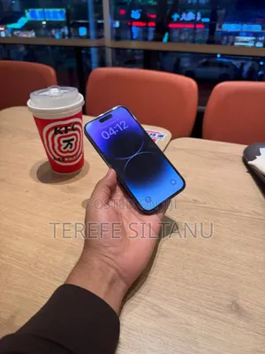 Photo - New Apple iPhone 14 Pro 128 GB Purple