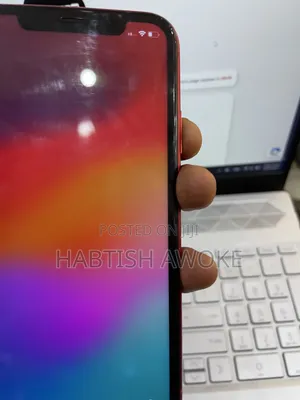 Photo - Apple iPhone 11 64 GB Red