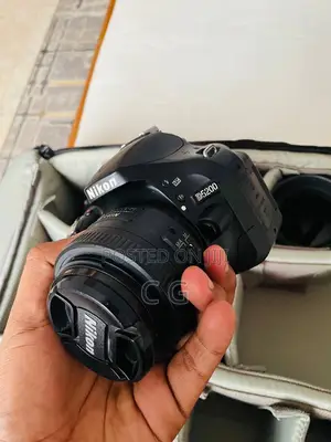 Photo - Nikon D5200 DSLR Camera + 3 Lenses Kit