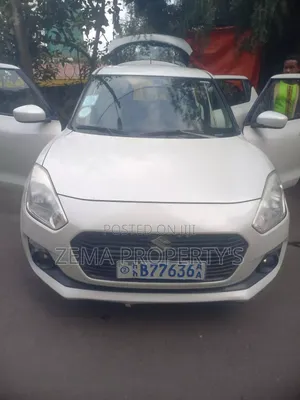 Photo - Suzuki Swift 2021 White