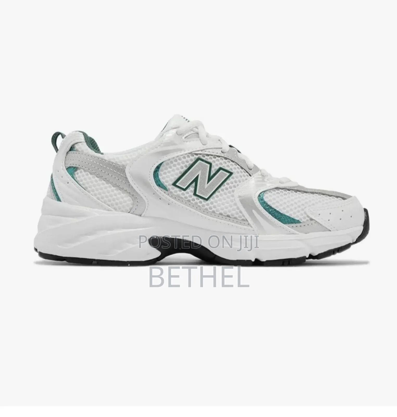 Trend Alert: New Balance 530 White Metallic Sneakers