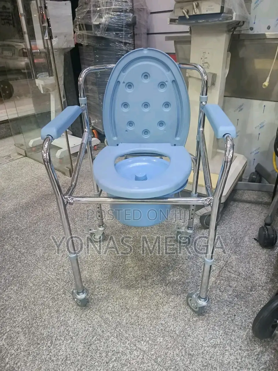 Toilet Chair/Plastic Seat, and a Removable Bucket for Waste Disposal.