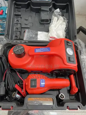 Photo - Electrical Car Jack With Battery Jumper