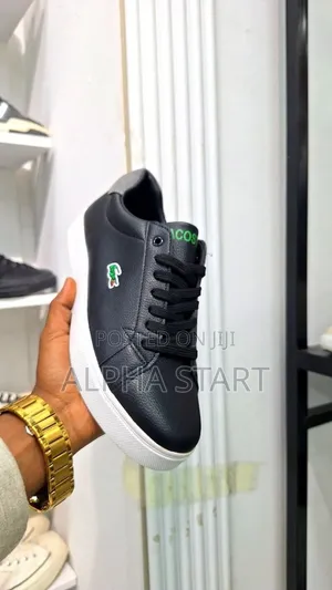   Flat Lacoste Sneakers 
 Made in Vietnam