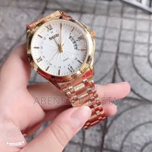 Photo - Gold-Toned Skmei 9069 Men's Quartz Watch With a Stainless Steel