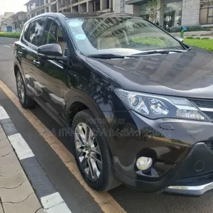 Photo - Toyota RAV4 2015 Maroon