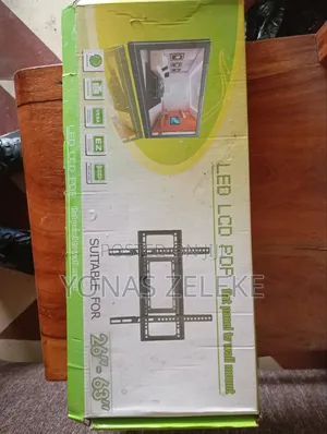 Photo - Flat Panel Tv Wall Mount ቲቪ መስቀያ