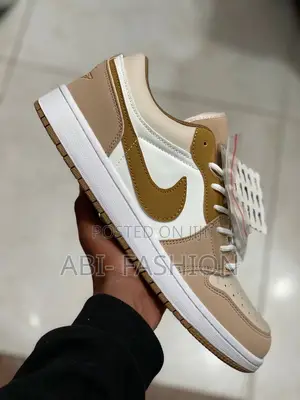 Nike Air Jordan 1 Low Se in a "Hemp Light British Tan" Colorway.
