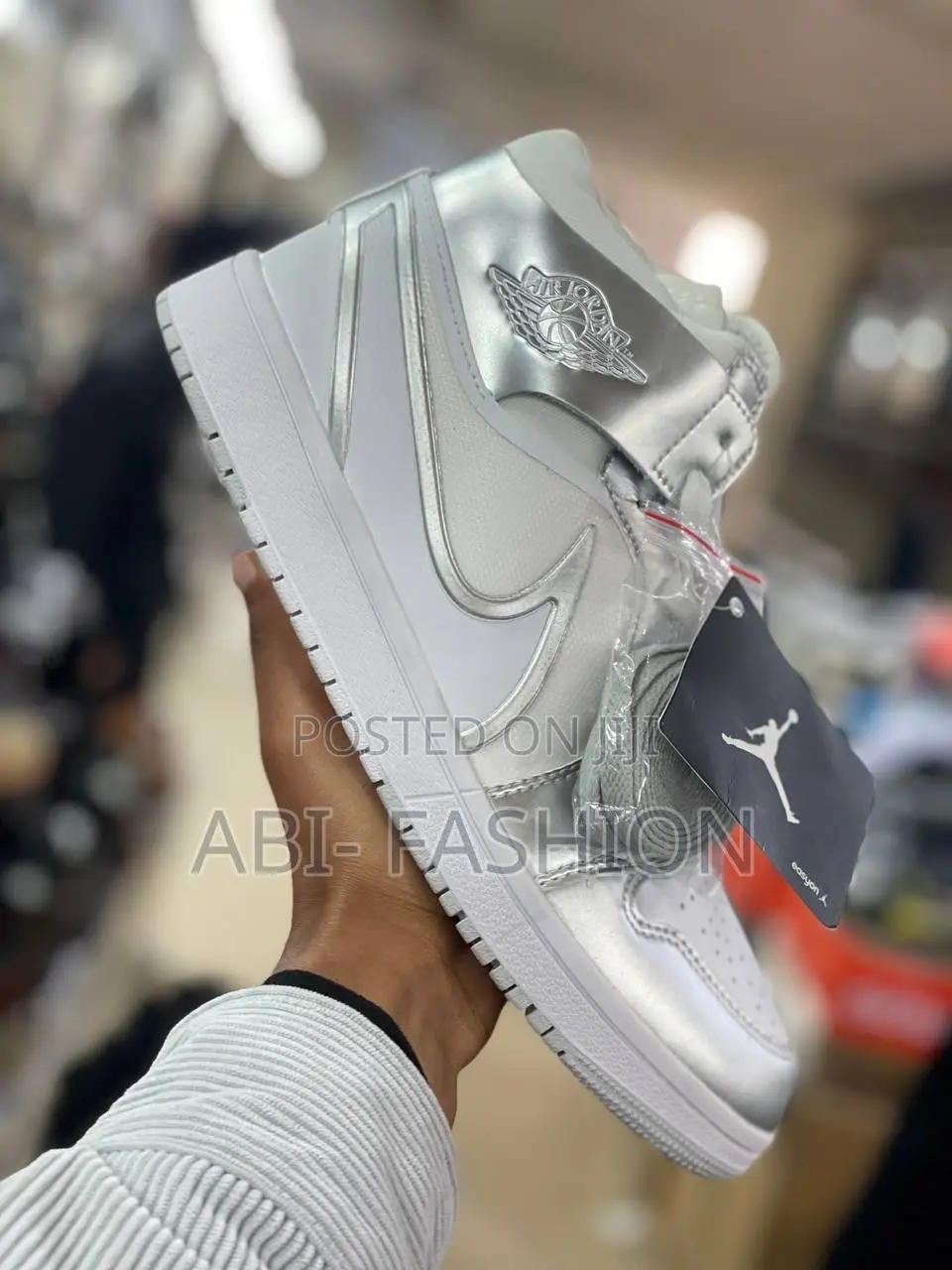 Nike Air Jordan 1mid Metallic Silver Colorway.