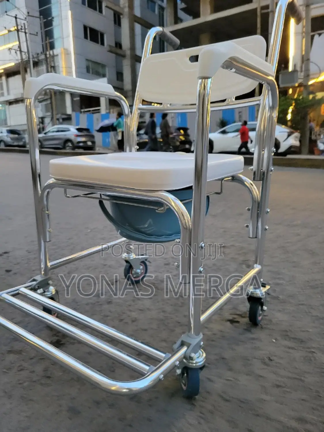 Commode Chair髷商toilet Chair窗二positioned Over a Standard Toilet.