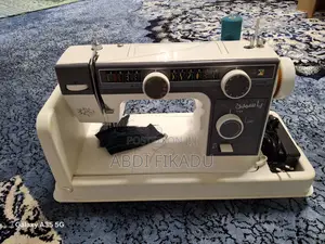 ልብስ መስፊያ ማሽን