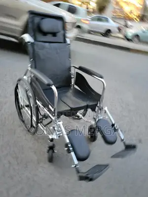 Wheelchair/Adjusted From a 90-Degree Seated Position to a Reclined 180