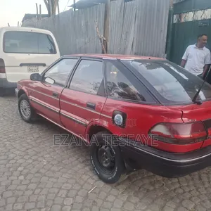 Photo - Toyota Corolla 1.3 Hatchback 1991 Red