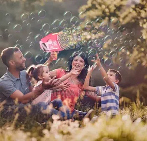 Photo - Kids Electric Bubble Blower Toy, Handheld Water Bubble Blowing Machin