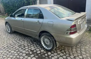 Photo - Toyota Corolla 2003 Gold