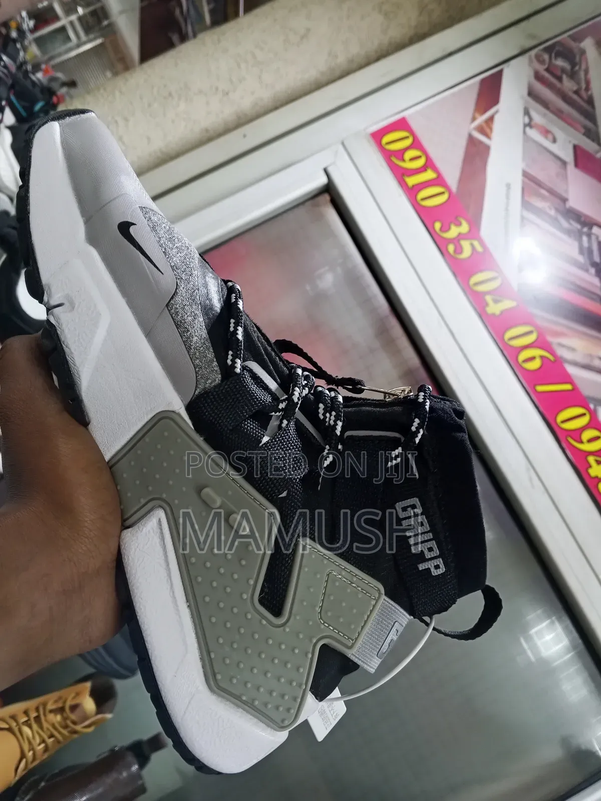 This Is Anike Air Huarache Gripp in a Black, White and Grey Colorway