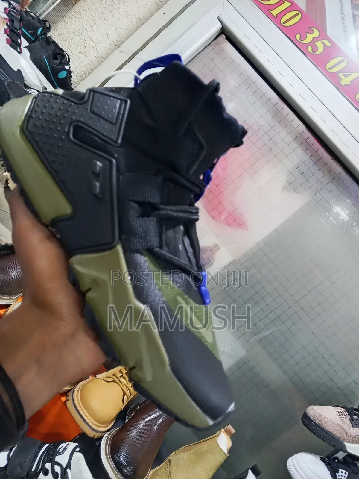 This Is Anike Air Huarache Gripp in a Black, White and Grey Colorway