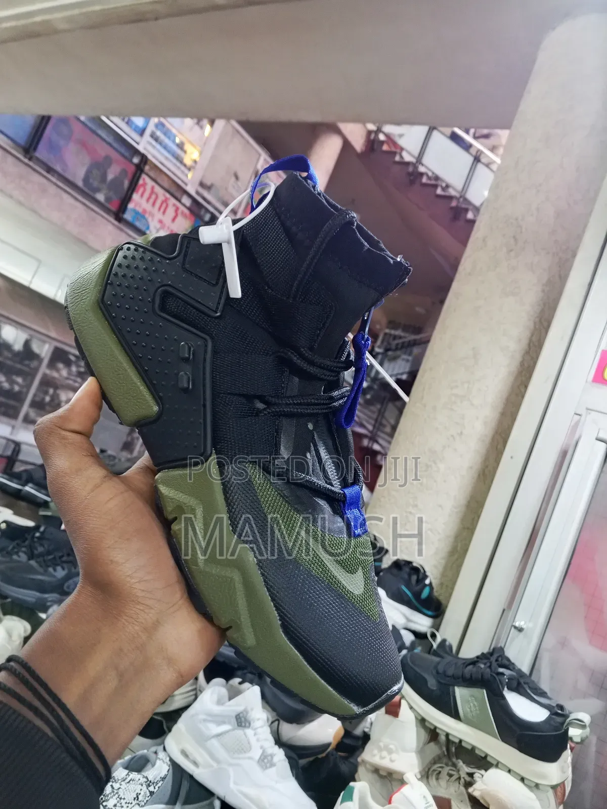 This Is Anike Air Huarache Gripp in a Black, White and Grey Colorway