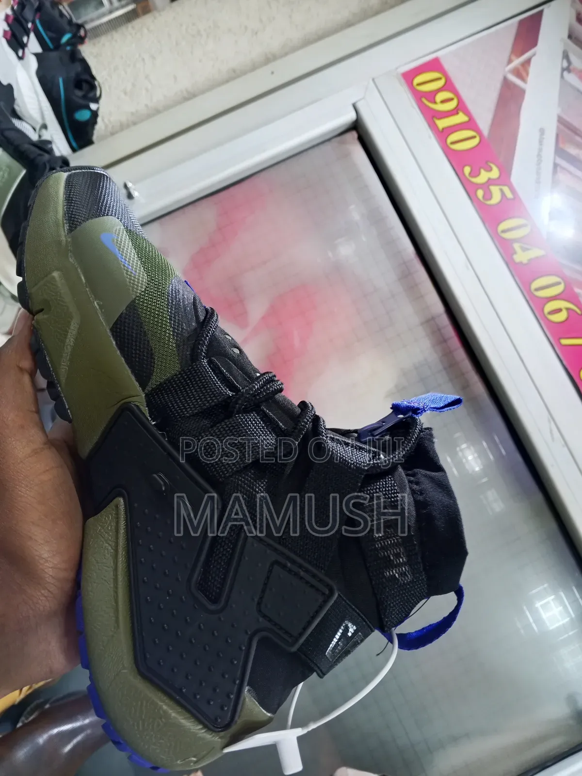 This Is Anike Air Huarache Gripp in a Black, White and Grey Colorway