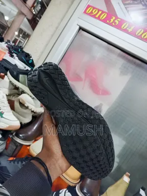 This Is Anike Air Zoom in White and Red in Ablack