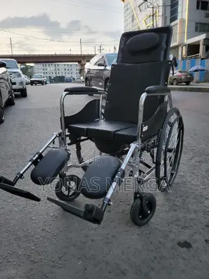 Photo - Toilet Wheelchair鮪脊it Serves as Both a Commode a Shower Chair.