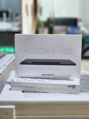 Photo - New Samsung Galaxy Tab S9 FE+ 128 GB Gray