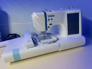 ኢምብሮደሪ እና የስፌት ማሽን Embroidery and Sewing Machin