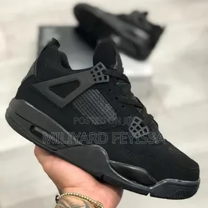 Photo - Jordan 4 Black Cat
