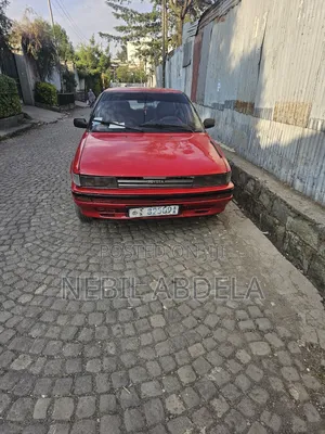 Photo - Toyota Corolla Hatchback 1990 Red