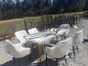 Photo - Dining Table With Epoxy by Metal Legs