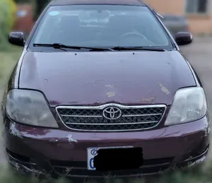 Photo - Toyota Corolla 2003 Burgundy