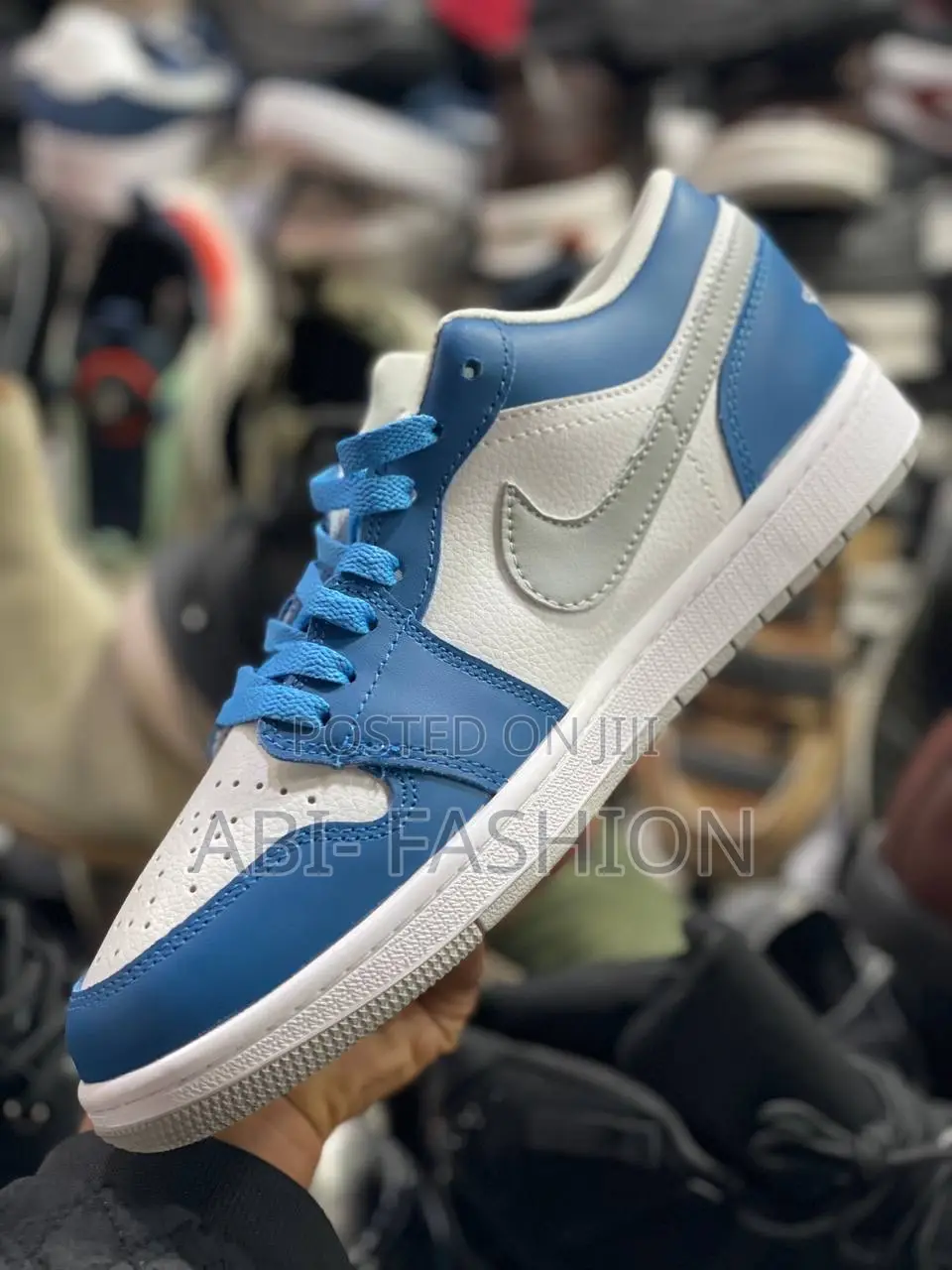 Nike Air Jordan 1 Low "True Blue" Sneaker.