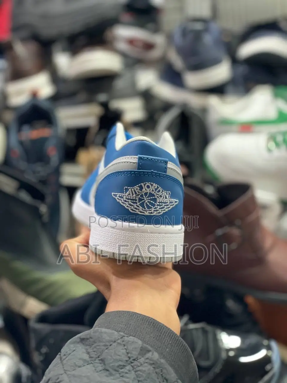 Nike Air Jordan 1 Low "True Blue" Sneaker.