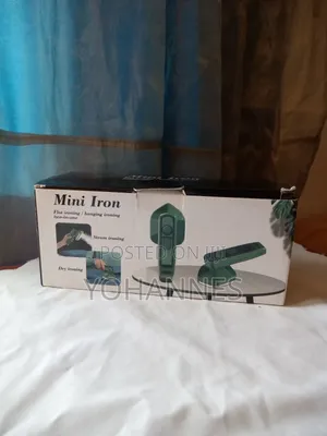 Photo - Mini Electric Stream Iron With Spray