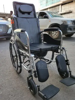 Toilet Chair島劉wheelchair卍0it Features an Adjustable Backrest, Headrest