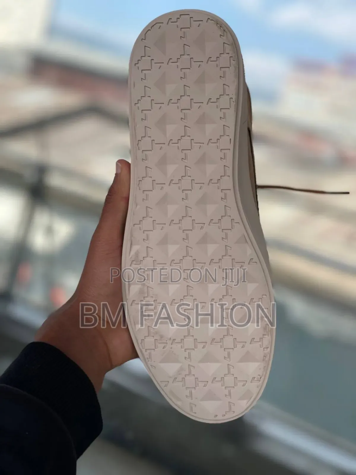 Cat Urban Stride Leather Sneakers in a Brown or Sand Color