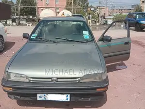 Photo - Toyota Corolla 1993 Brown