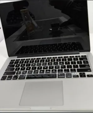 Photo - New Apple MacBook Pro 2024 M3 14-inch 8GB Intel Core i5 SSD 128GB