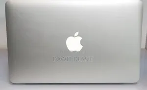 Photo - New Apple MacBook Air 2025 M4 13-Inch 4GB Intel Core I5 SSD 128GB