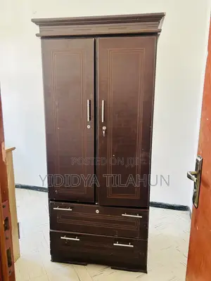 Photo - Brown Cloth Cabinet