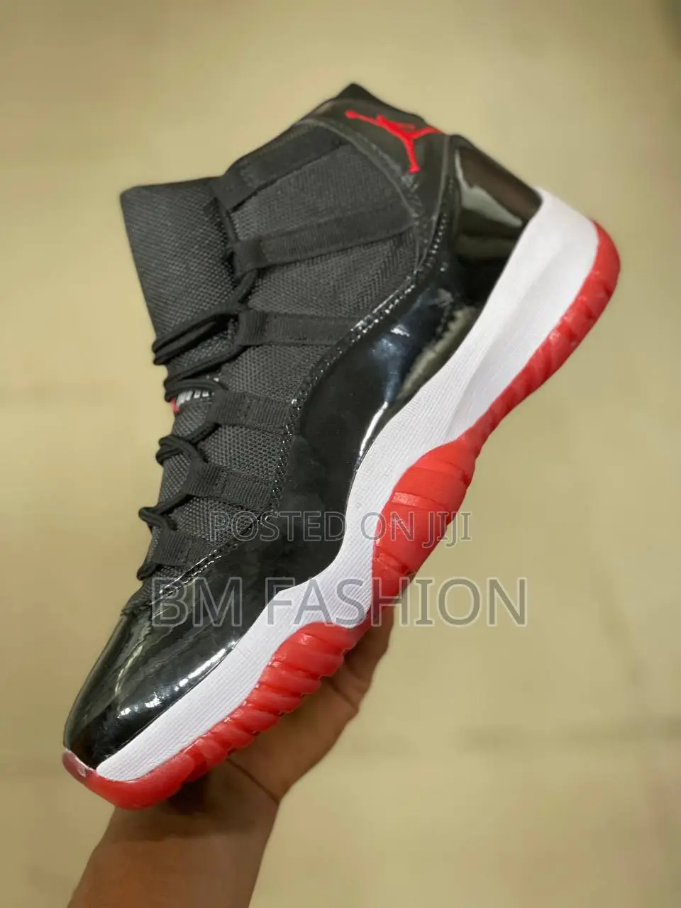 Nike Air Jordan 11 Retro "Bred" Sneakers.