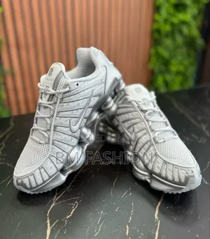 Photo - Nike Shox Tl Low-Top Sneakers on Sale