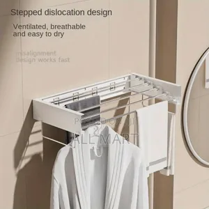 Photo - Wall-Mounted Collapsible Clothes Drying Rack